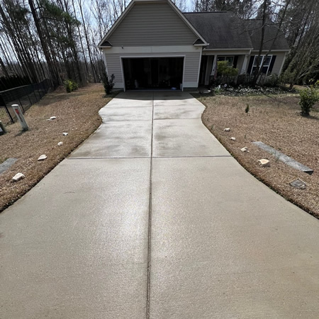 Why Humidity in Johnston County, NC Makes Driveway Cleaning More Important Than Homeowners Think